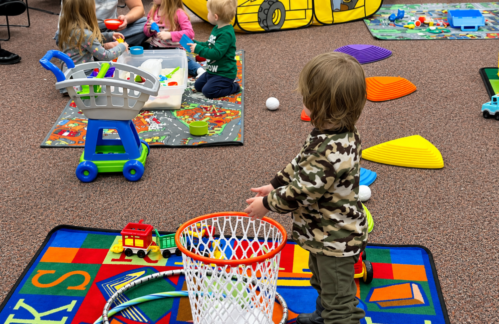 Children playing in a sensory bin